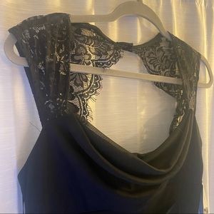 Classy black dress with lace details.